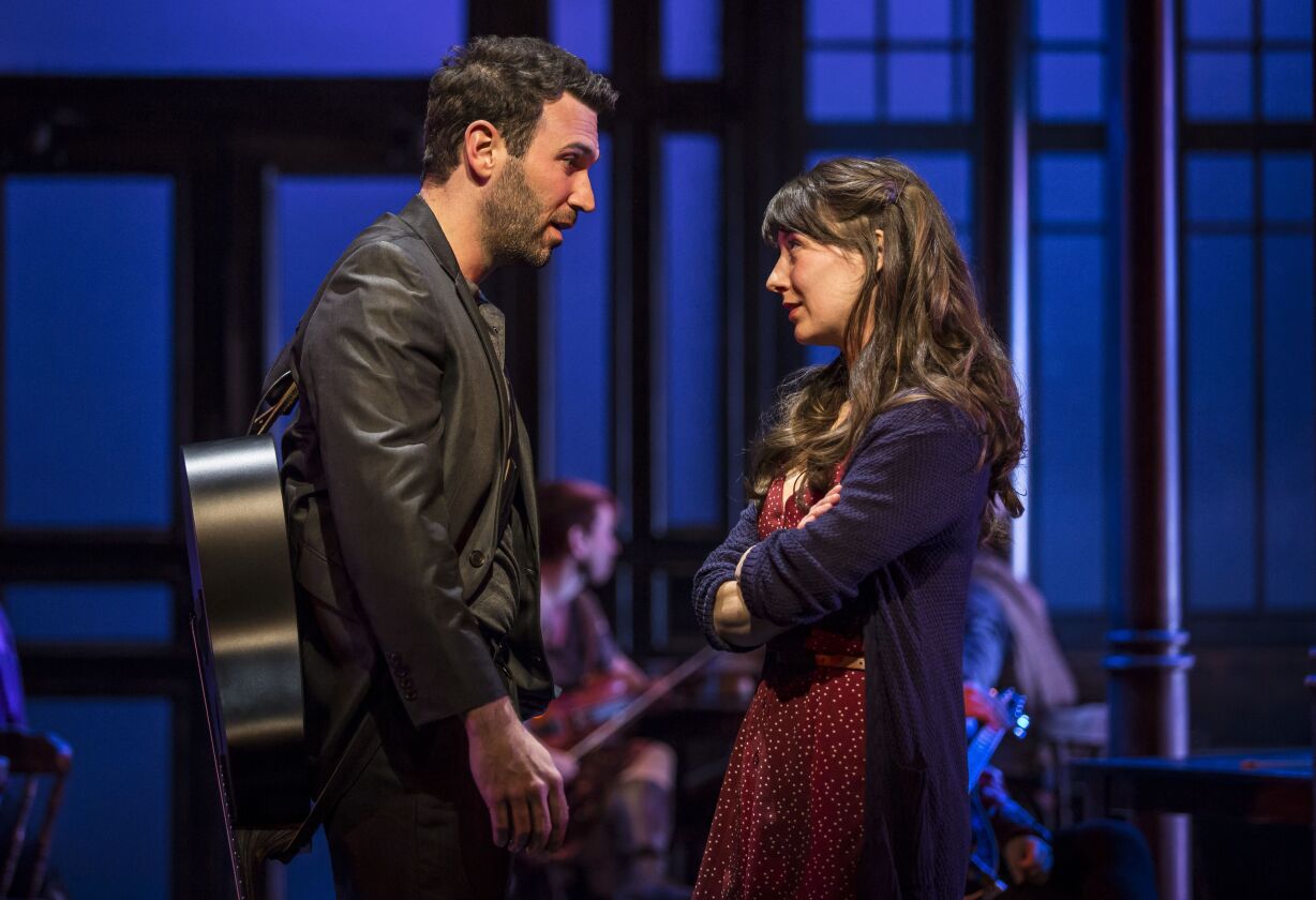 Barry DeBois plays Guy and Tiffany Topol portrays Girl in “Once,” directed by Jim Corti at the Paramount Theatre in Aurora. | Liz Lauren
